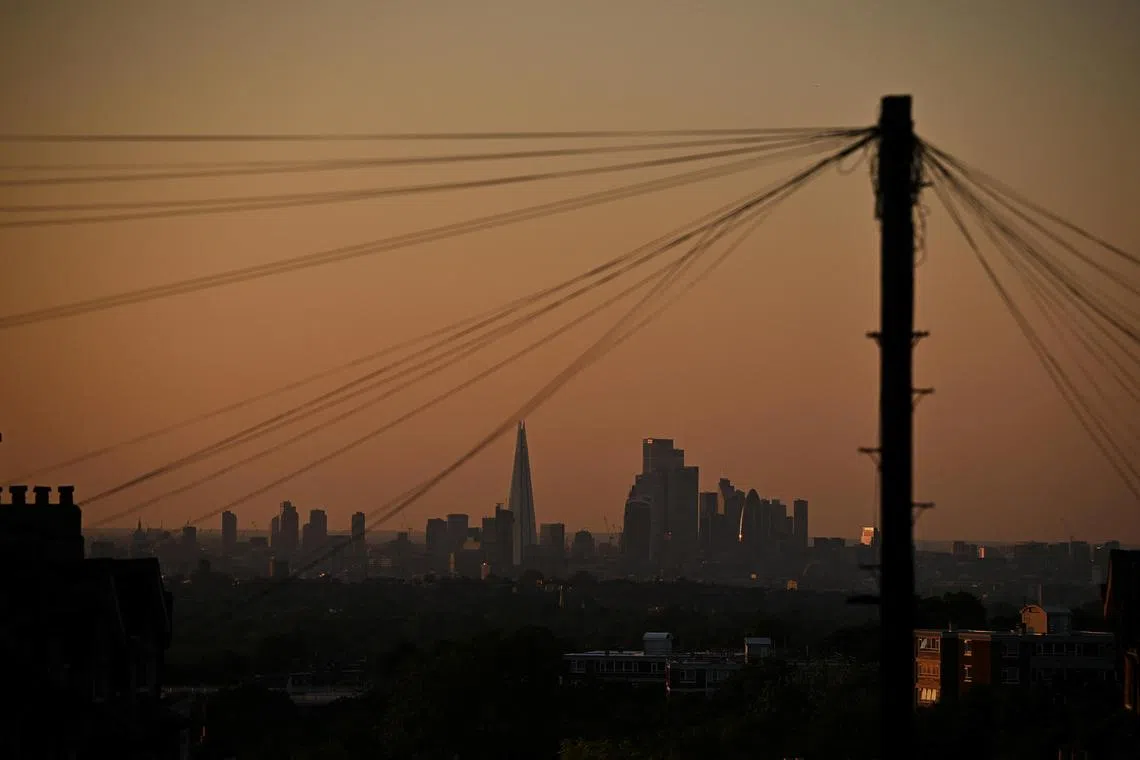 The sun sets over the capital’s skyline as warm temperatures, wind and emissions combined to trigger a ‘high’ alert for air pollution, in London, Britain, June 13, 2023.   REUTERS/Dylan Martinez