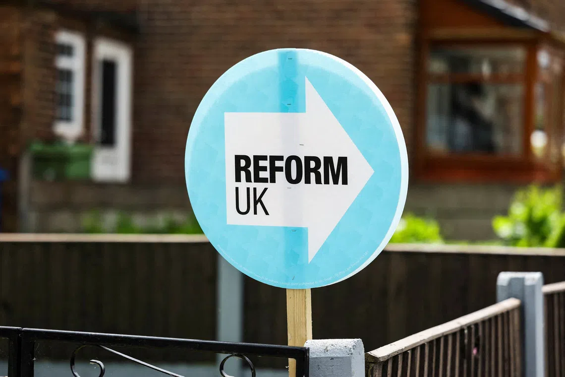 FILE PHOTO: A campaign placard for the Reform UK party is displayed outside a residential property at Bolton Road, ahead of the Makerfield by-election, in Ashton-in-Makerfield, Britain, June 5, 2026. REUTERS/Temilade Adelaja/File Photo