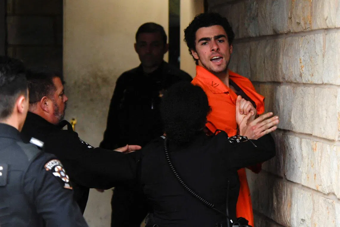 Luigi Mangione, 26, a suspect in the New York City killing of UnitedHealth executive Brian Thompson, arrives for an extradition hearing at Blair County Court House in Hollidaysburg, Pennsylvania, U.S. December 10, 2024.  REUTERS/Matthew Hatcher