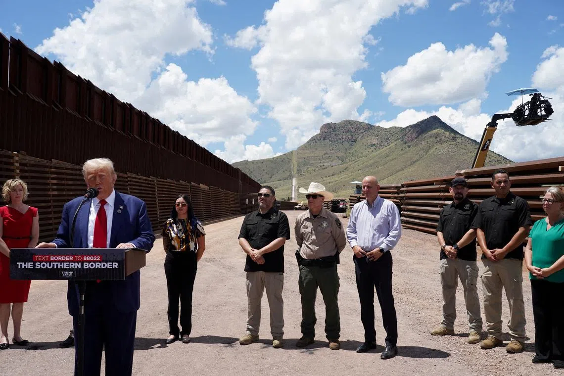 FILE PHOTO: Republican presidential nominee Donald Trump speaks during a visit at the frontier with Mexico in Hereford, Cochise County, Arizona, U.S. August 22, 2024. REUTERS/Go Nakamura/File Photo/File Photo