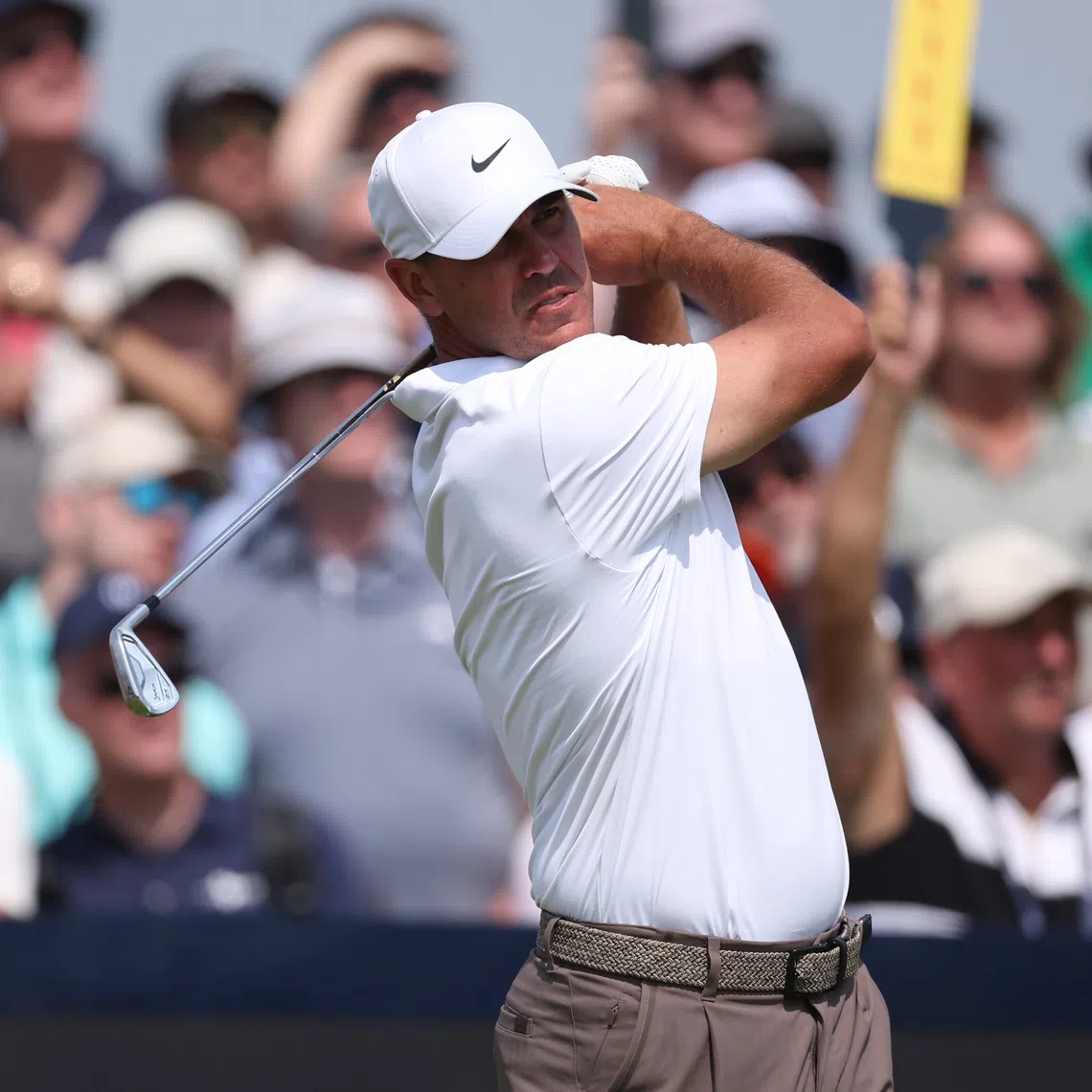Jul 17, 2026; Southport, ENG; Brooks Koepka watches his shot from the ninth tee during the second round of The Open Championship golf tournament at Royal Birkdale. Mandatory Credit: Bill Streicher-Imagn Images