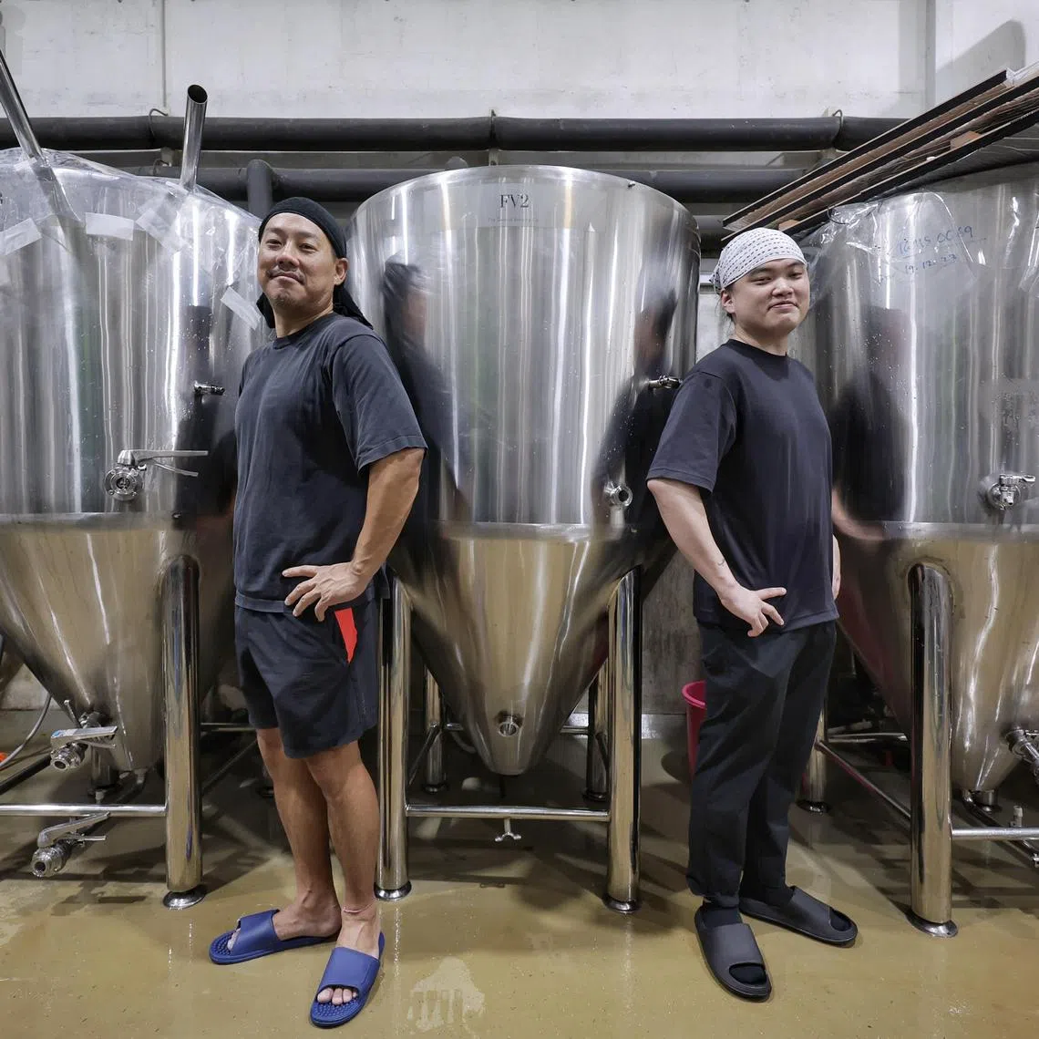 Partners at Orchid Craftworks Yosuke Hosoi (left), 40, and Reuben Oh, 30, at the premises of Singapore's first sake brewery on Aug 5, 2024.
