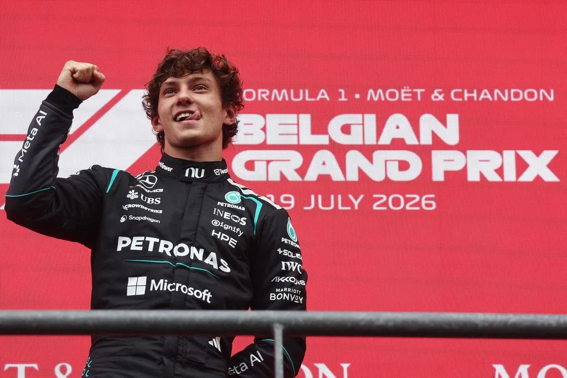 Mercedes’ Andrea Kimi Antonelli celebrates on the podium after winning the Belgian Grand Prix.