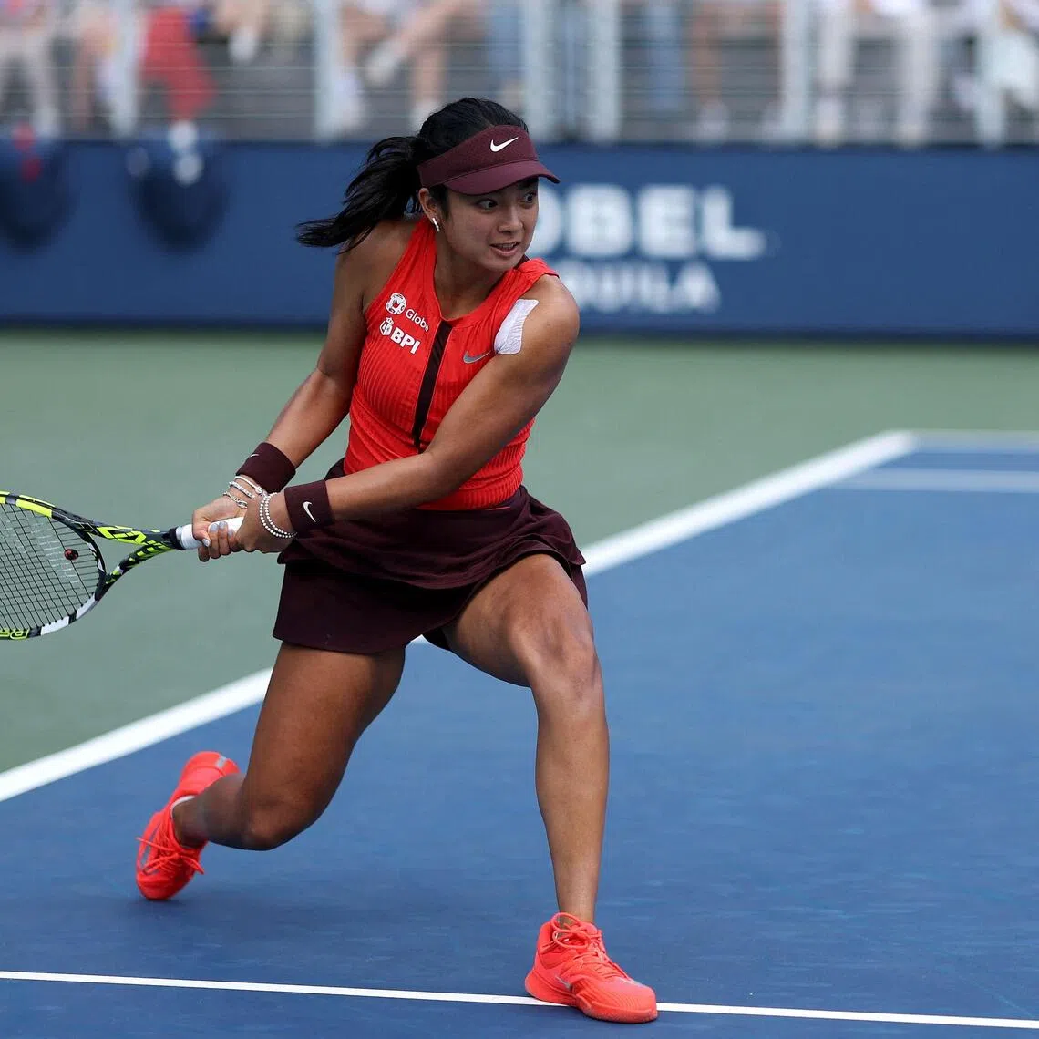 Alexandra Eala of the Philippines returns against Cristina Bucsa of Spain at the US Open.