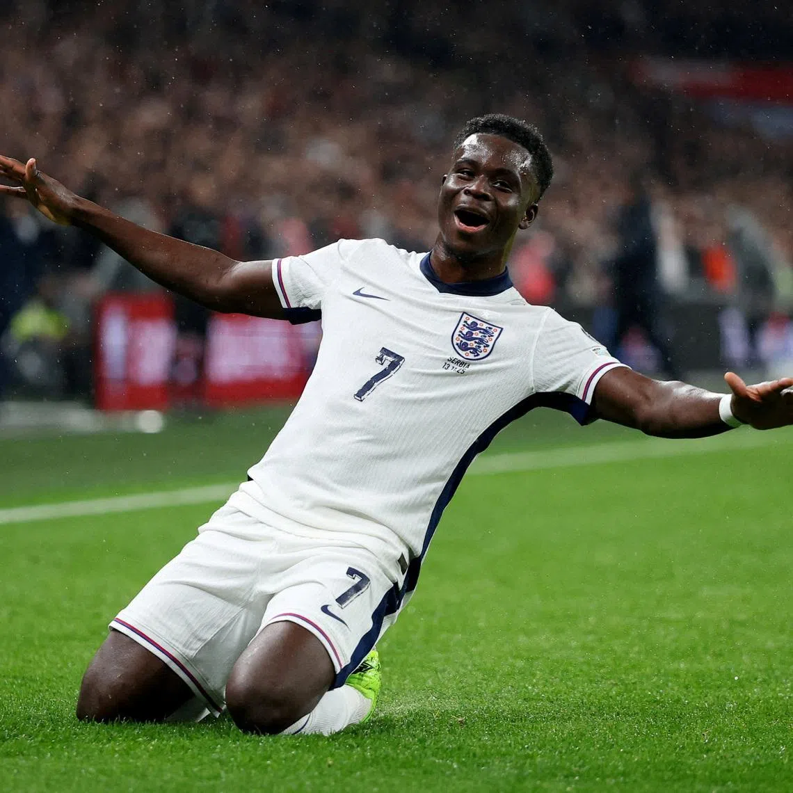 FILE PHOTO: Soccer Football - World Cup - UEFA Qualifiers - Group K - England v Serbia - Wembley Stadium, London, Britain - November 13, 2025 England's Bukayo Saka celebrates scoring their first goal REUTERS/Toby Melville/File Photo