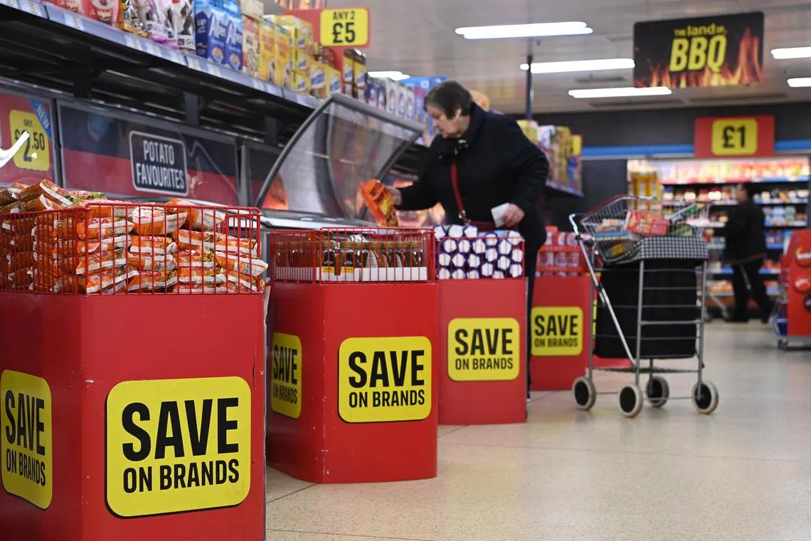 Shop price inflation in Britain slowed to 8.8 per cent in April from a record high of 8.9 per cent the previous month,