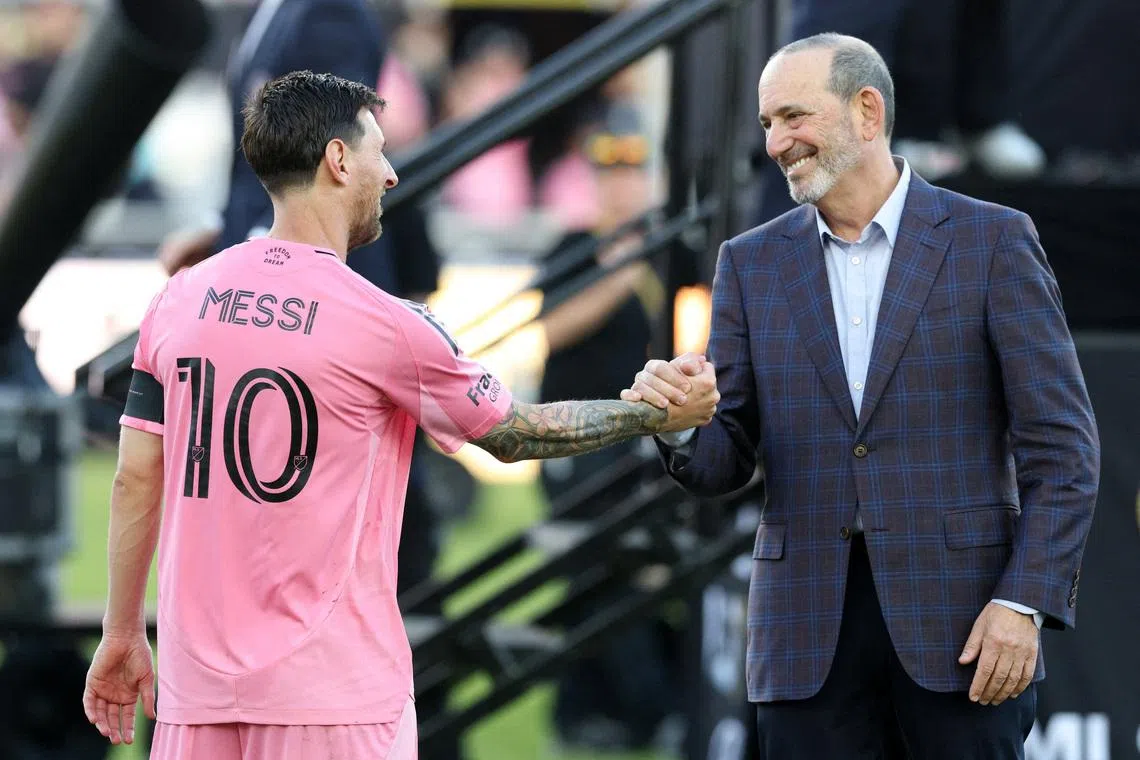 FILE PHOTO: Dec 6, 2025; Fort Lauderdale, Florida, USA; Inter Miami forward Lionel Messi (10) shakes hands with MLS commissioner Don Garber after winning the 2025 MLS Cup against the Vancouver Whitecaps FC at Chase Stadium. Mandatory Credit: Nathan Ray Seebeck-Imagn Images/File Photo
