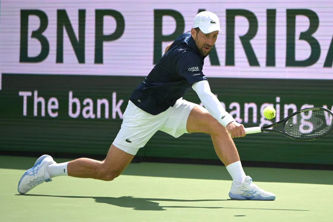 Mar 9, 2026; Indian Wells, CA, USA;  Novak Djokovic (SRB) hits a shot during his third round match as he defeated Aleksandar Kovacevic (USA) during the BNP Paribas Open at the Indian Wells Tennis Garden. Mandatory Credit: Jayne Kamin-Oncea-Imagn Images