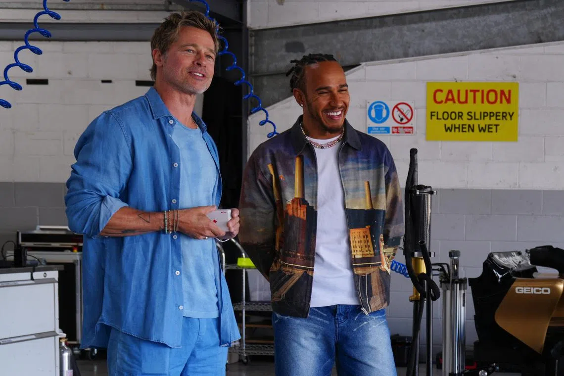 Brad Pitt (left) and Lewis Hamilton on the set of F1 The Movie.