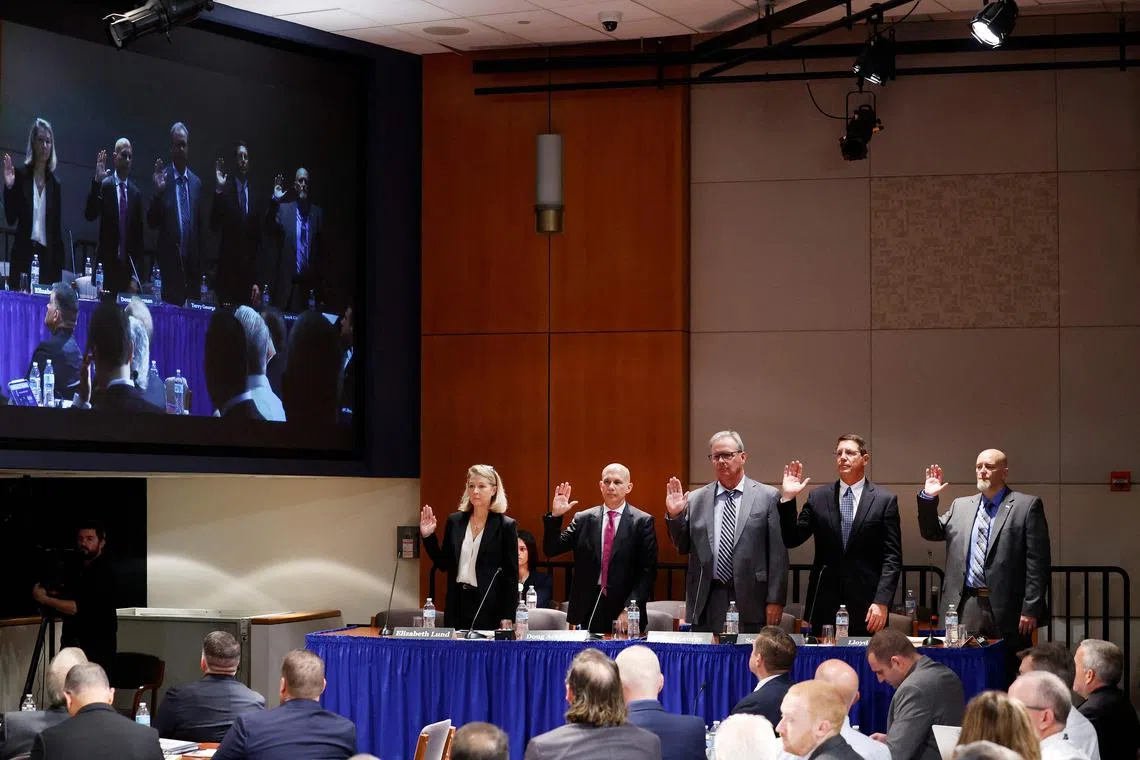 Being sworn in at the two-day NTSB hearing are (from left) Boeing's Elizabeth Lund and Doug Ackerman, Spirit AeroSystems' Terry George and Scott Grabon, and Mr Lloyd Catlin, a representative from the International Association of Machinists.