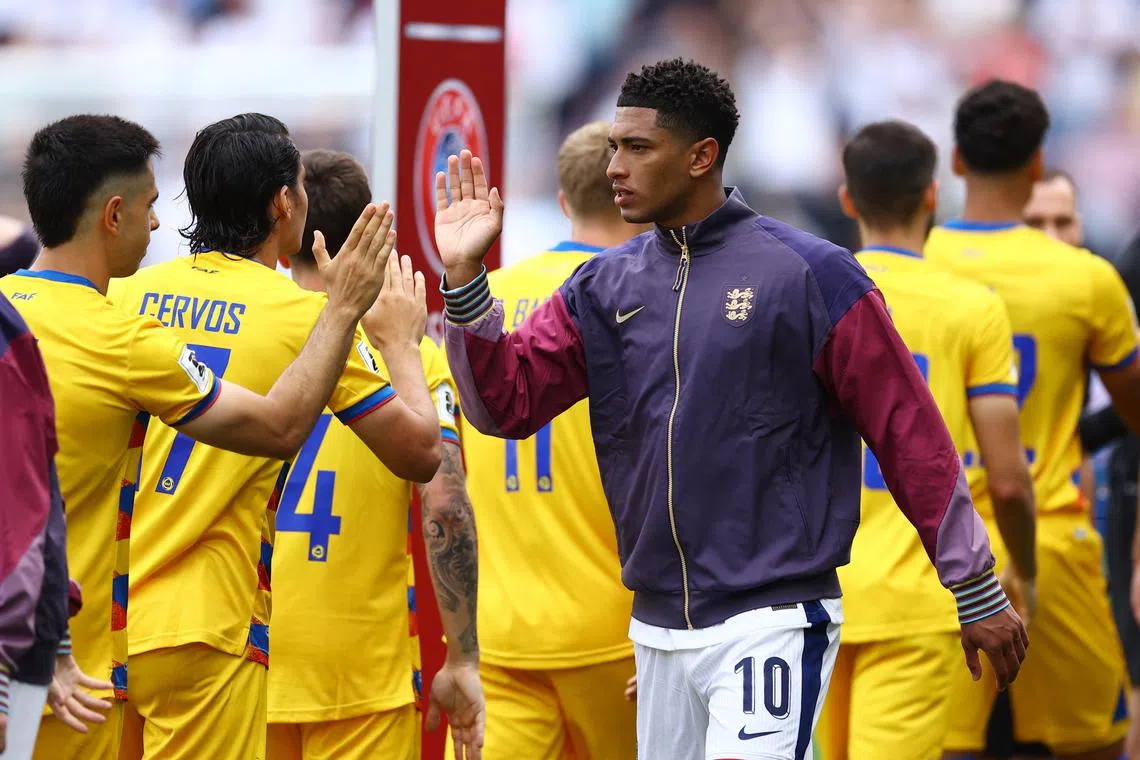FILE PHOTO: Soccer Football - World Cup - European Qualifiers - Group K - Andorra v England - RCDE Stadium, Cornella de Llobregat, Spain - June 7, 2025 England's Jude Bellingham shakes hands with the Andorra players before the match Action Images via Reuters/Albert Gea/File Photo