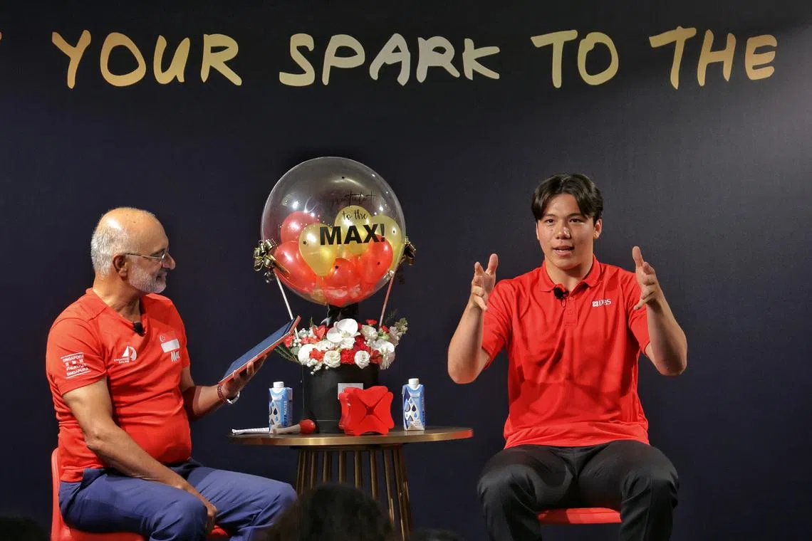 DBS chief executive officer Piyush Gupta (left) with kitefoiler Maximilian Maeder during a fireside chat on Aug 15.