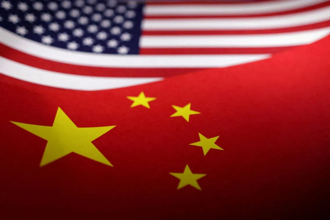 FILE PHOTO: U.S. and Chinese flags are seen in this illustration taken, April 24, 2024. REUTERS/Dado Ruvic/Illustration/File Photo