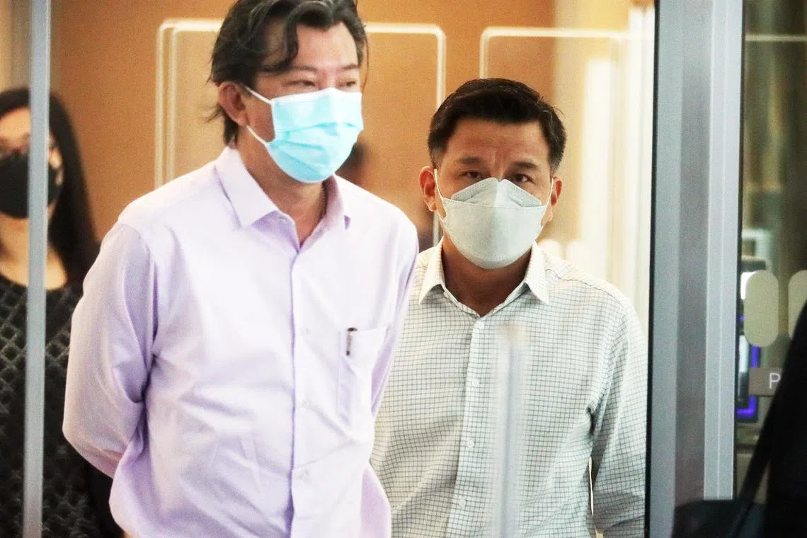 Neo Chye Koon (left) and Wong Chee Thiam at the courts in March 2022. Both Neo and Wong pleaded guilty to a graft charge on Oct 13.
