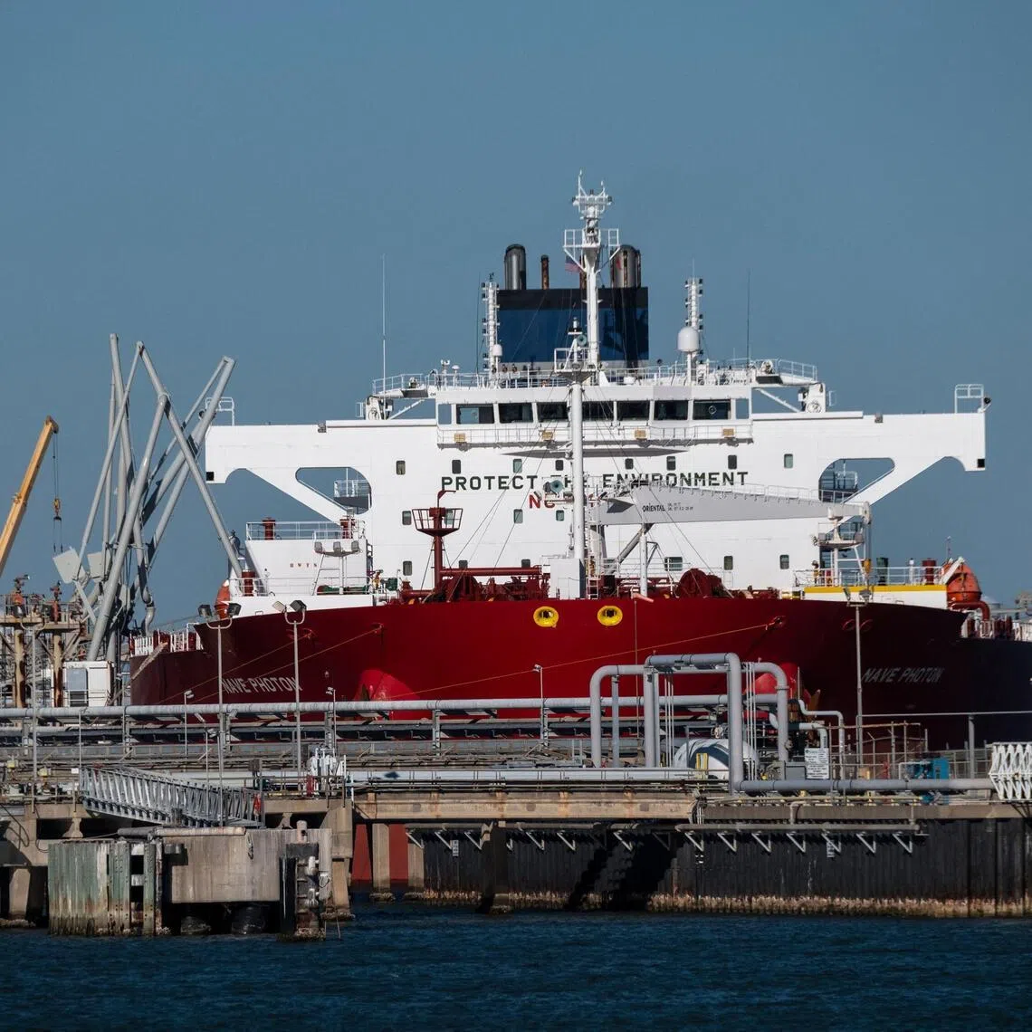 FREEPORT, TEXAS - JANUARY 14: The Nave Photon crude oil tanker is docked at Freeport Marine Terminal II on January 14, 2026 in Freeport, Texas. The vessel chartered by Chevron transported oil from Venezuela to the United States.   Joel Angel Juarez/Getty Images/AFP (Photo by Joel Angel Juarez / GETTY IMAGES NORTH AMERICA / Getty Images via AFP)