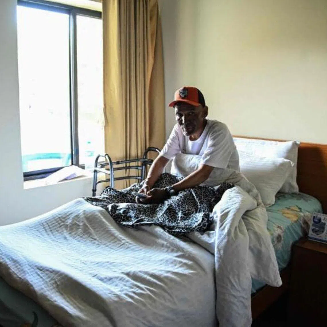 Everest survivor Dawa Sherpa rests during his recovery at a hotel in Kathmandu on June 18.