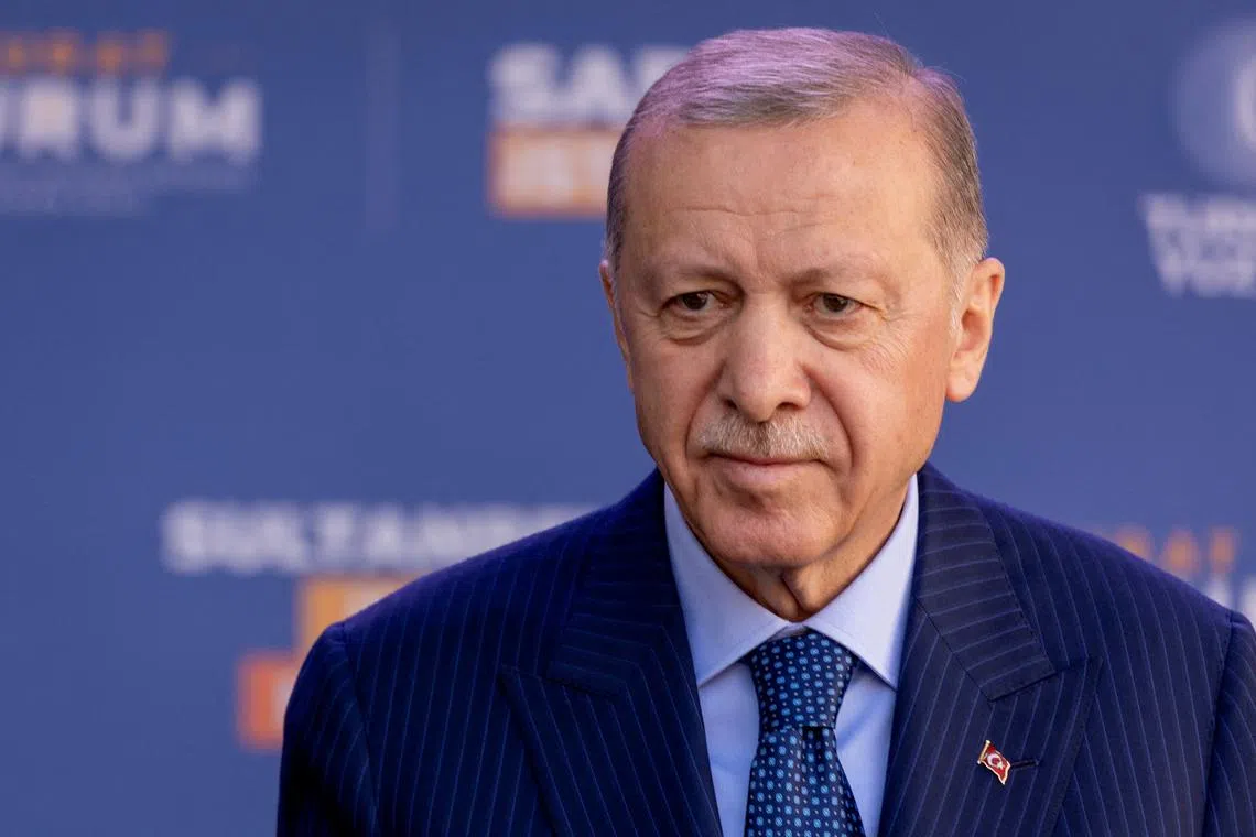 FILE PHOTO: Turkish President Tayyip Erdogan addresses his supporters ahead of the local elections in Istanbul, Turkey, March 29, 2024. REUTERS/Umit Bektas/File Photo