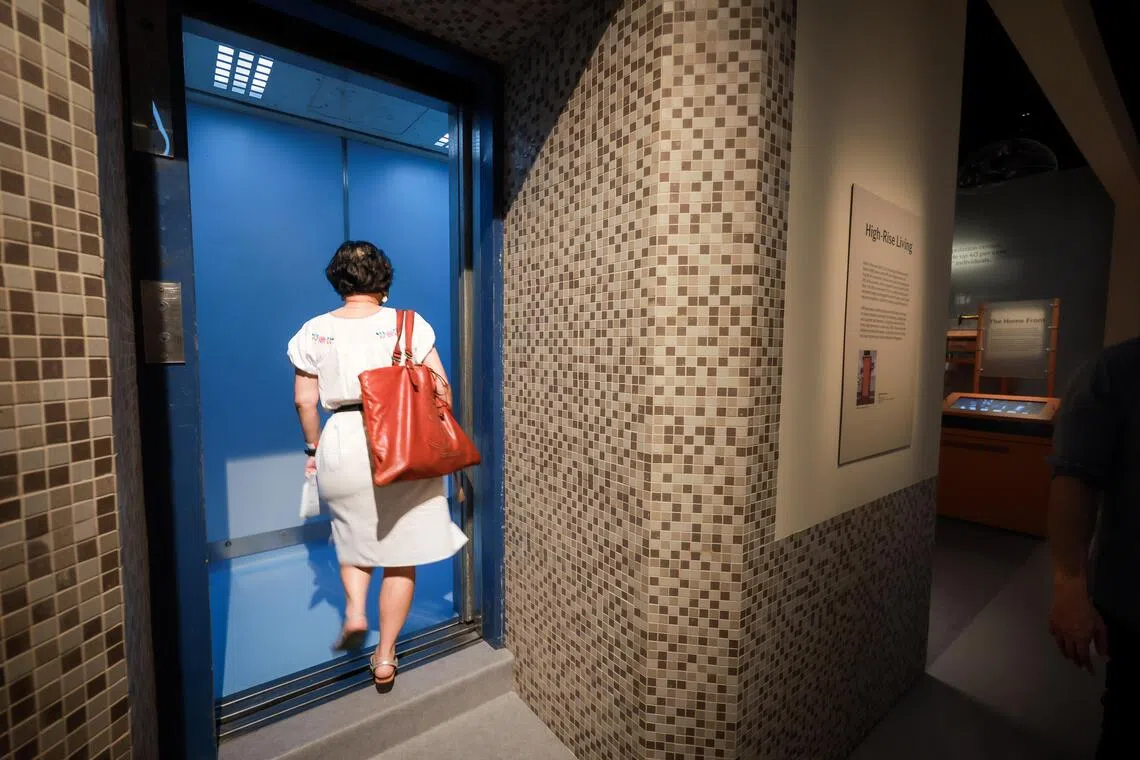 An HDB lift dating from the 1970s is displayed in the revamped Singapore History Gallery at the National Museum of Singapore.