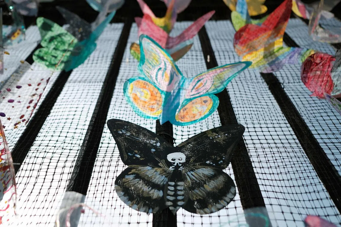 A memorial to those impacted by Covid-19, and done in collaboration between Naming the Lost Memorials, City Lore and Green-Wood Cemetery, displaying tributes in art made by 20 community groups at Green-Wood Cemetery on May 08, 2023 in the Brooklyn borough of New York City. The memorial, which comes as the U.S. ends its pandemic emergency on Thursday after more than three years of social disruption, at least 6 million hospitalisations and 1.1 million U.S. deaths, is on display till May 30.   