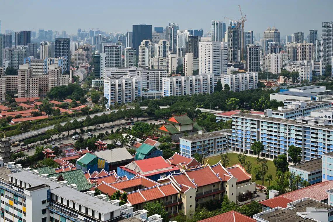 ST20231016-202332225037-Lim Yaohui-pixgeneric/
Lian Shan Shuang Lin Monastery (middle) surrounded by HDB flats in Toa Payoh, Pan-island expressway and HDB flats in Whampoa as viewed from Kim Keat Beacon on Oct 16, 2023.
Can be used for stories on road, transport, oil, petrol, diesel, COE, LTA, Land Transport Authority, traffic, money, property, land, invest, budget, income, finance, financial, URA, housing, marriage, religion, fertility, population, economy, and development.
(ST PHOTO: LIM YAOHUI)