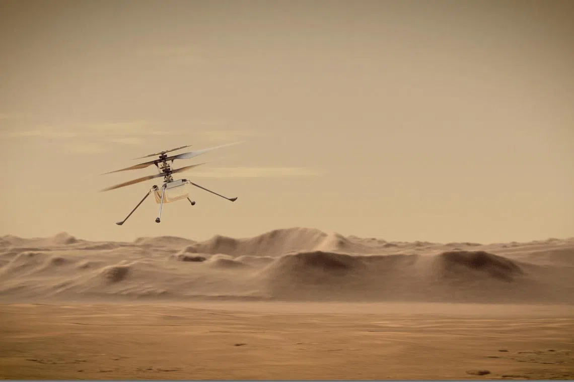 An artist’s impression of Nasa’s Mars helicopter, Ingenuity, flying through the Red Planet’s skies.