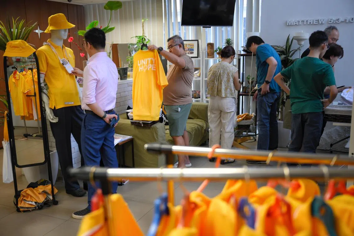 People shopping for souvenirs ahead of Pope Francis' visit to Singapore at the Catholic Centre on Sept 4.