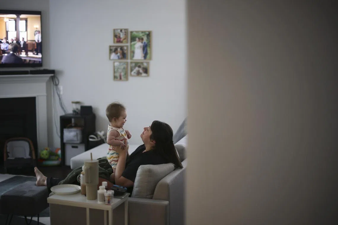 Allie Strickland playing with her her 9-month-old son, August, at home in Goose Creek, S.C. on June 1, 2023. Strickland has dealt with both postpartum depression and postpartum anxiety since the birth of her first child. (Travis Dove/The New York Times)
