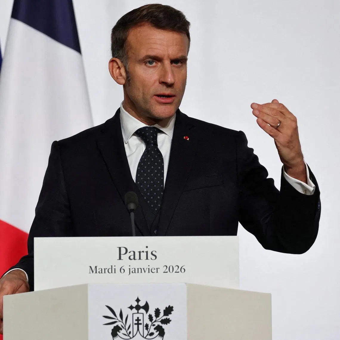 FILE PHOTO: France's President Emmanuel Macron delivers a press conference upon the signing of the declaration on deploying post-ceasefire force in Ukraine during the so-called 'Coalition of the Willing' summit, at the Elysee Palace in Paris, France, January 6, 2026. Ludovic Marin/Pool via REUTERS/File Photo