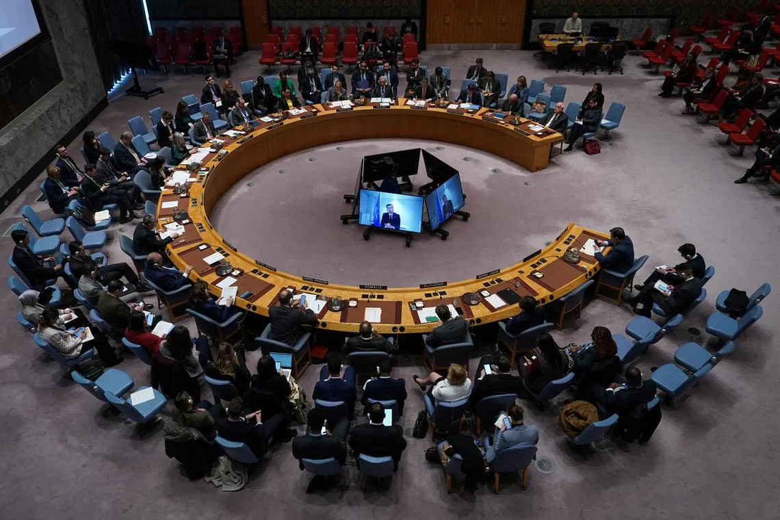 People attend a Security Council meeting at the United Nations headquarters in New York City, U.S., March 18, 2025. REUTERS/Adam Gray/File Photo