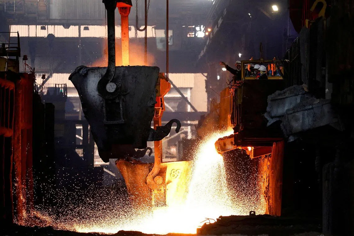 FILE PHOTO: Workers monitor the nickel melting process at a nickel smelter of PT Vale Tbk in Sorowako, South Sulawesi province, Indonesia, March 30, 2023. REUTERS/Ajeng Dinar Ulfiana/File Photo