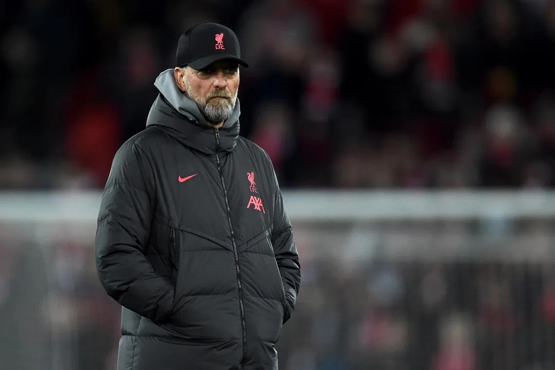 Liverpool manager Juergen Klopp watches his players warming up before the Uefa Champions League against Real Madrid on Feb 21.