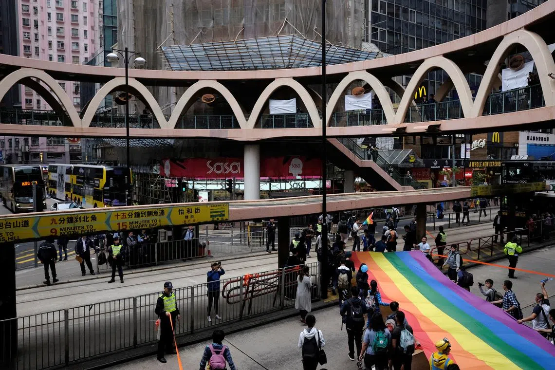 FILE PHOTO: Supporters of LGBT rights take part in the annual pride parade in Hong Kong, China November 25, 2017. REUTERS/Bobby Yip/File Photo