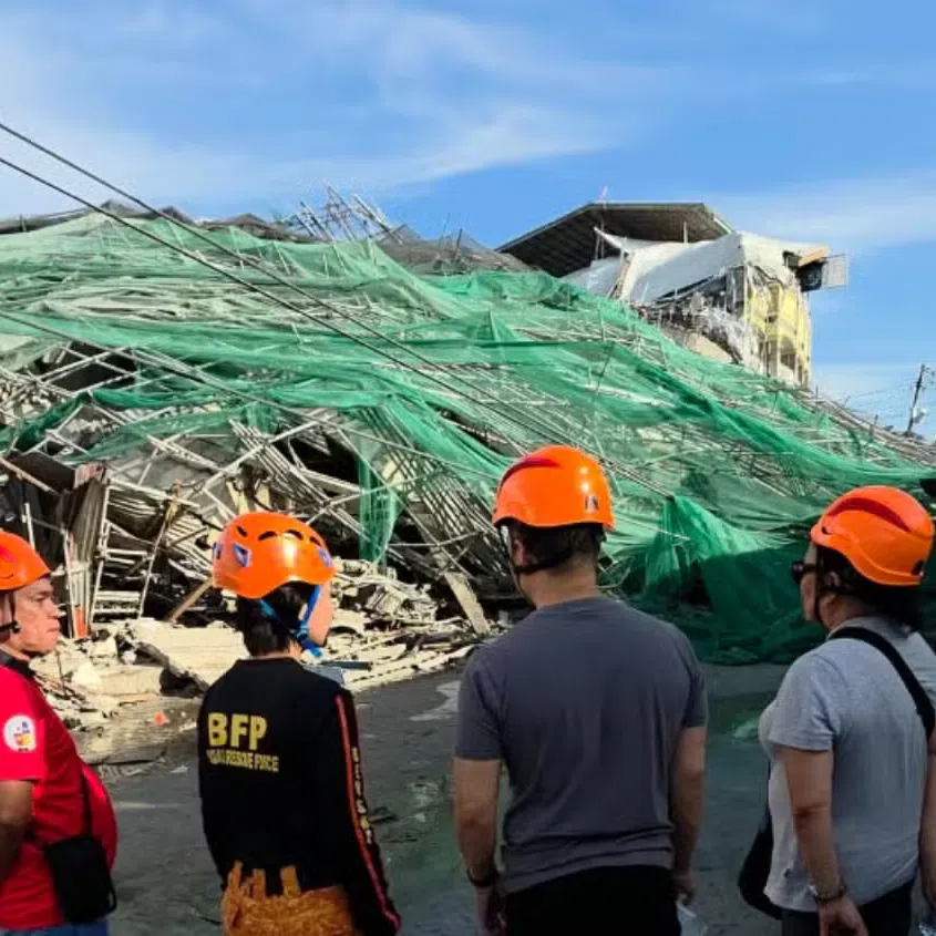 An unfinished nine-storey concrete building under construction near Manila collapsed early on May 24.