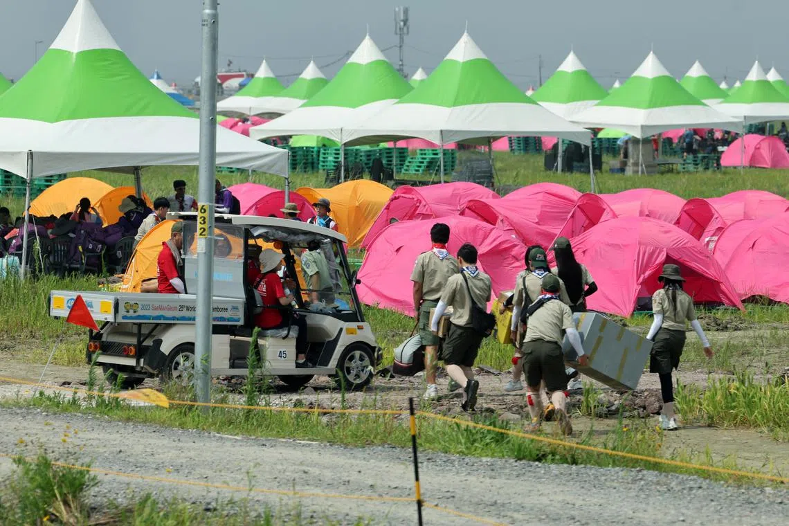 epa10779265 Attendees of the 25th World Scout Jamboree arrive at a scout camping site in the Saemangeum reclamation area in Buan, North Jeolla Province, on South Korea's west coast, 01 August 2023, as the international event kicks off later in the day for a 12-day run.  EPA-EFE/YONHAP SOUTH KOREA OUT
