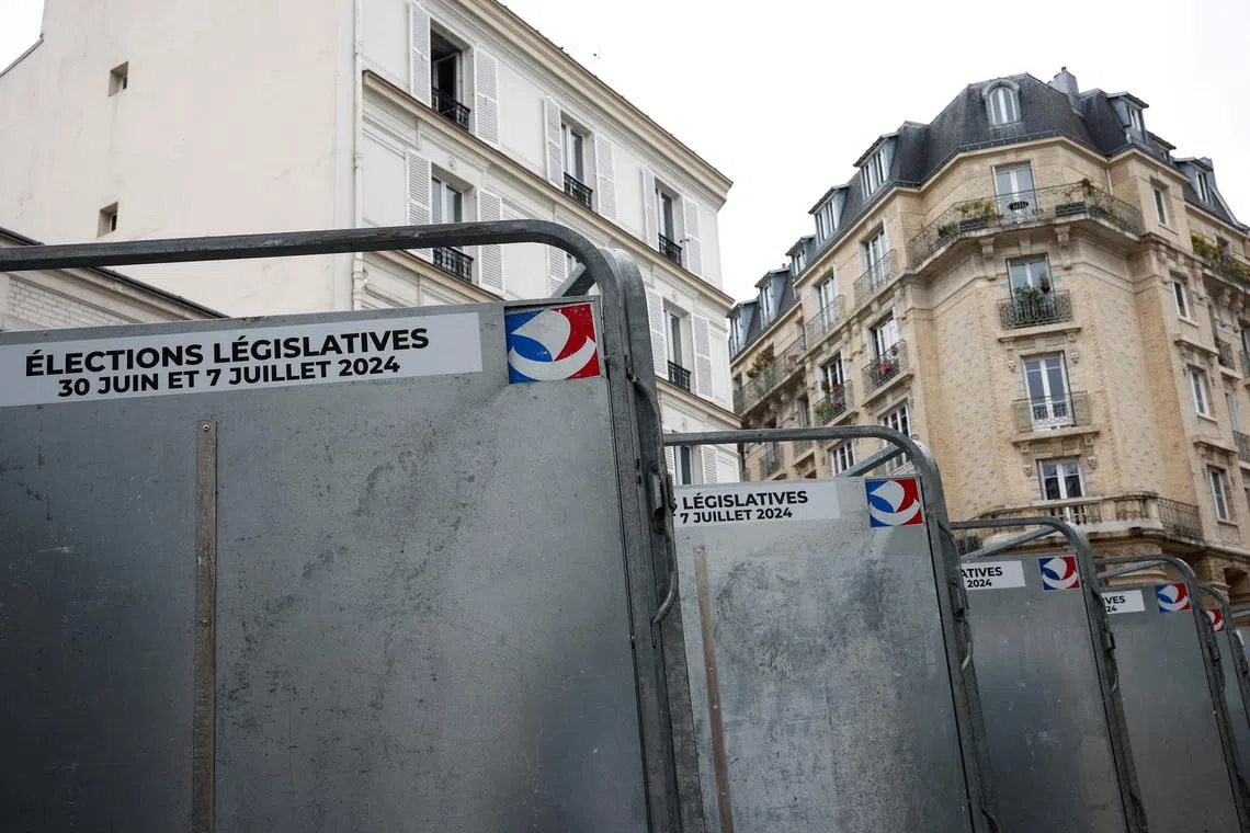 FILE PHOTO: Election boards are seen ahead of the June 30 and July 7 French parliamentary elections, in Paris, France, June 19, 2024. REUTERS/Benoit Tessier/File Photo