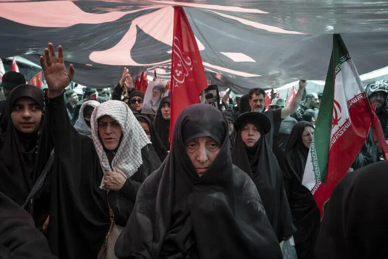 Mourners attending the funeral procession for Iran’s supreme leader Ali Khamenei in Tehran, on July 6, 2026.