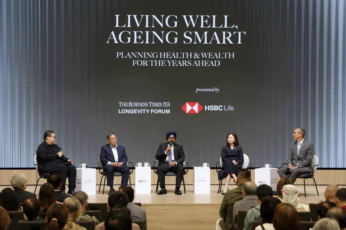 The first panel discussion, moderated by Dylan Tan, Senior Correspondent from The Business Times (far left), explore how Singaporeans can take a more holistic approach to ageing.. The panelists were (second from left to right) Chin Jing Jih, Deputy Group CEO (Clinical & Academic Development) of NHG Health; Harpreet Bindra, CEO of HSBC Life (Singapore); Sue-Anne Toh, CEO and Co-Founder of Novi Health; and Naras Lapsys, Chief Clinical Officer and Senior Dietitian of Chi Longevity.