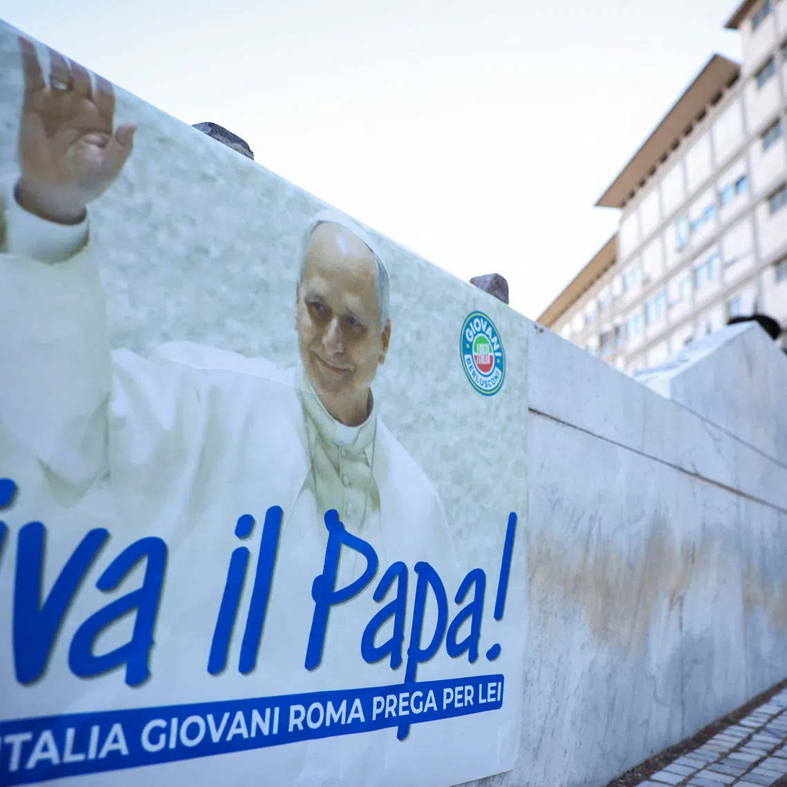 A poster reading “Long live the Pope!” outside Gemelli Hospital where he underwent surgery.
