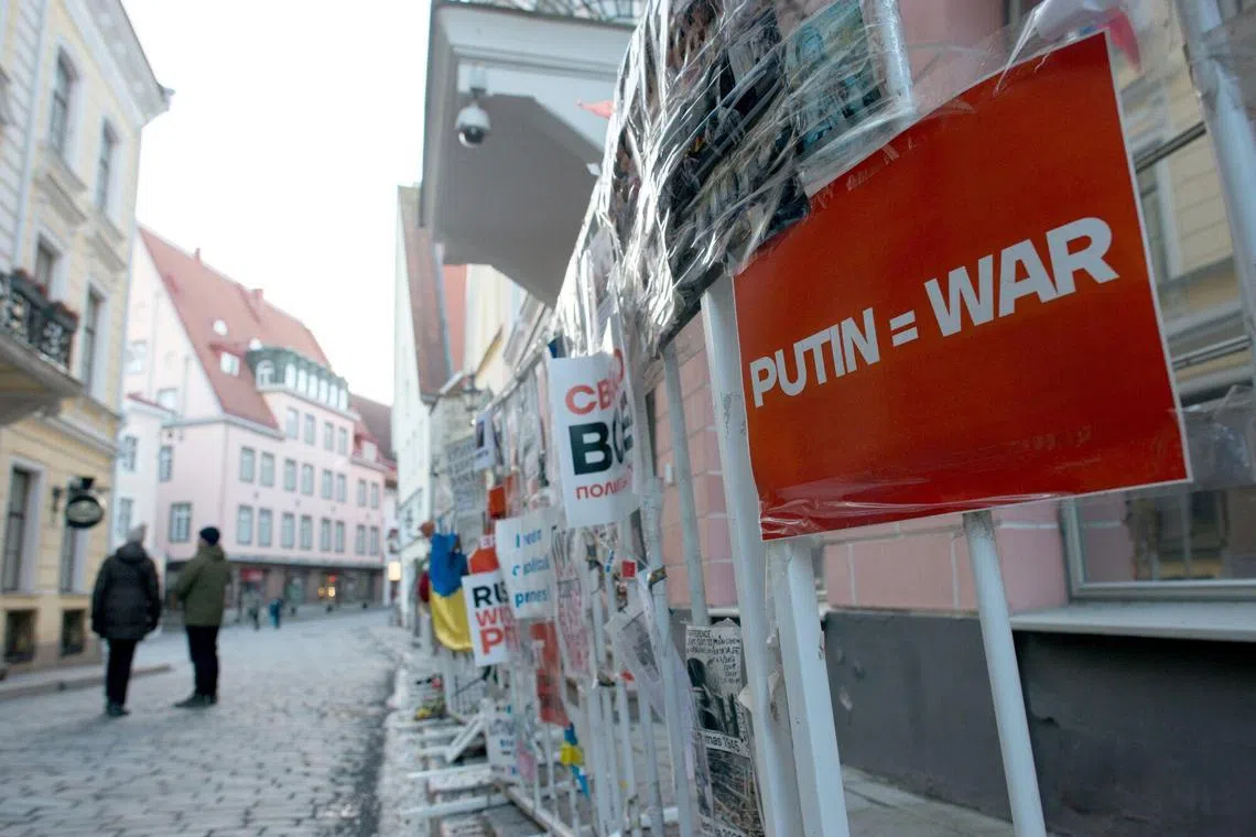 Anti-war and pro-Ukraine banners and messages outside the Russian Embassy in Tallinn, Estonia.