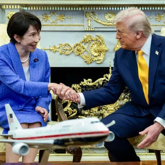 US President Donald Trump shakes hands with Japanese Prime Minister Sanae Takaichi in the Oval Office at the White House on March 19.