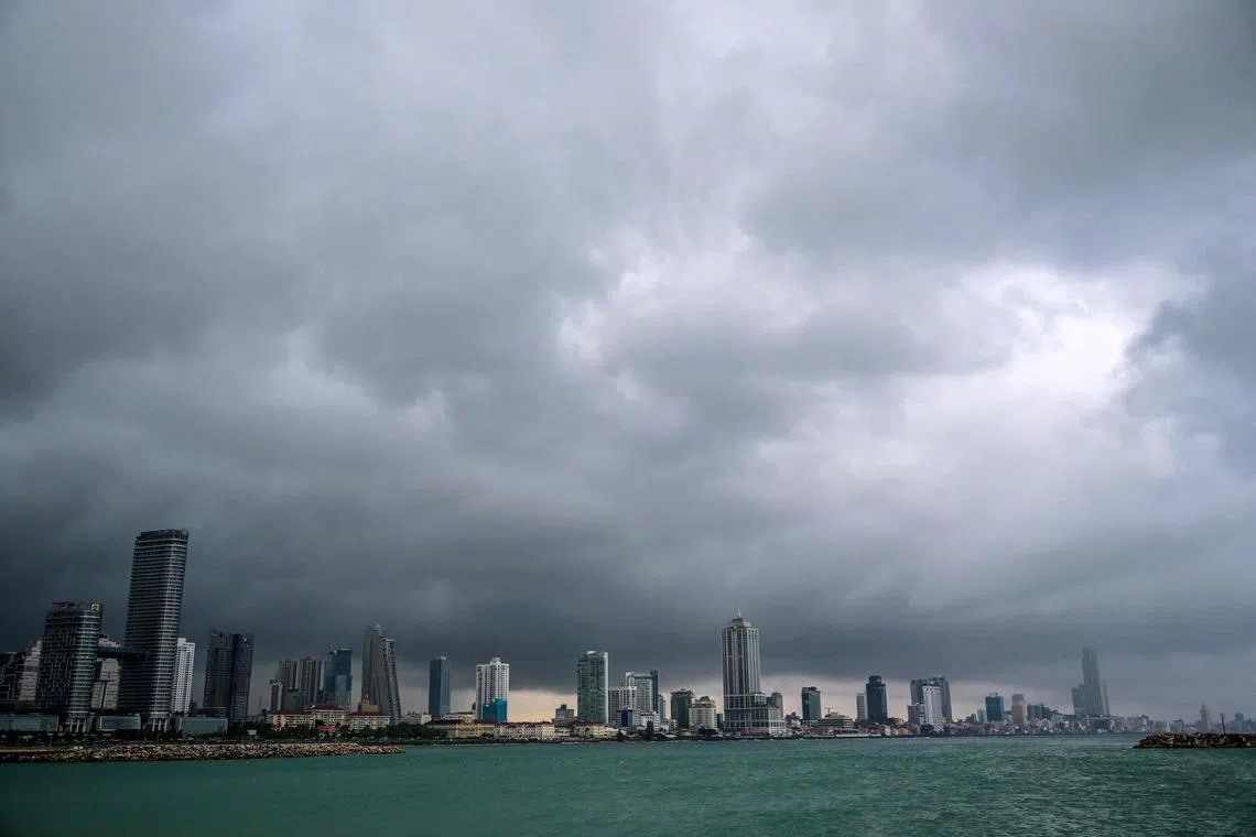 Dark clouds loom over the sky of Sri Lanka's capital Colombo on Nov 26, 2024. 