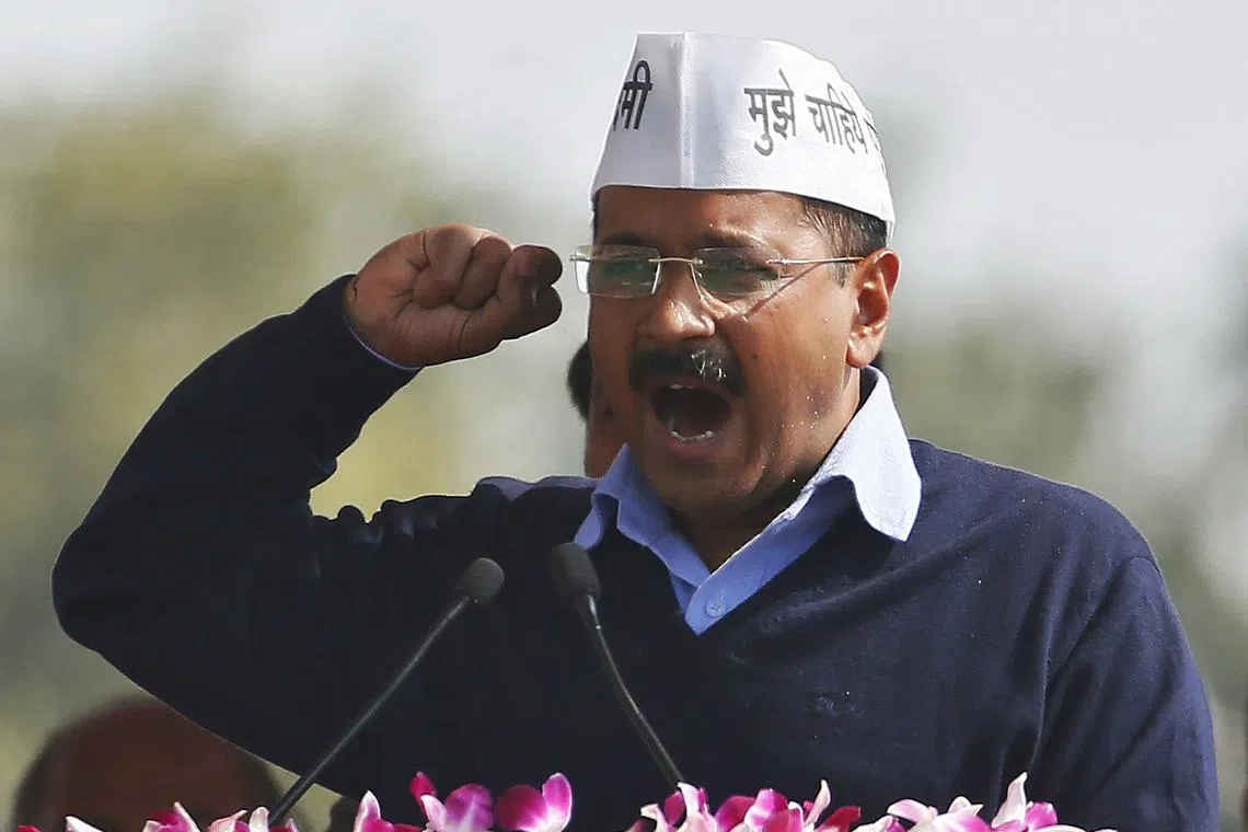 Arvind Kejriwal, chief of Aam Aadmi (Common Man) Party (AAP), addresses his supporters after taking the oath as the new chief minister of Delhi during a swearing-in ceremony at Ramlila ground in New Delhi February 14, 2015. REUTERS/Anindito Mukherjee/ File photo