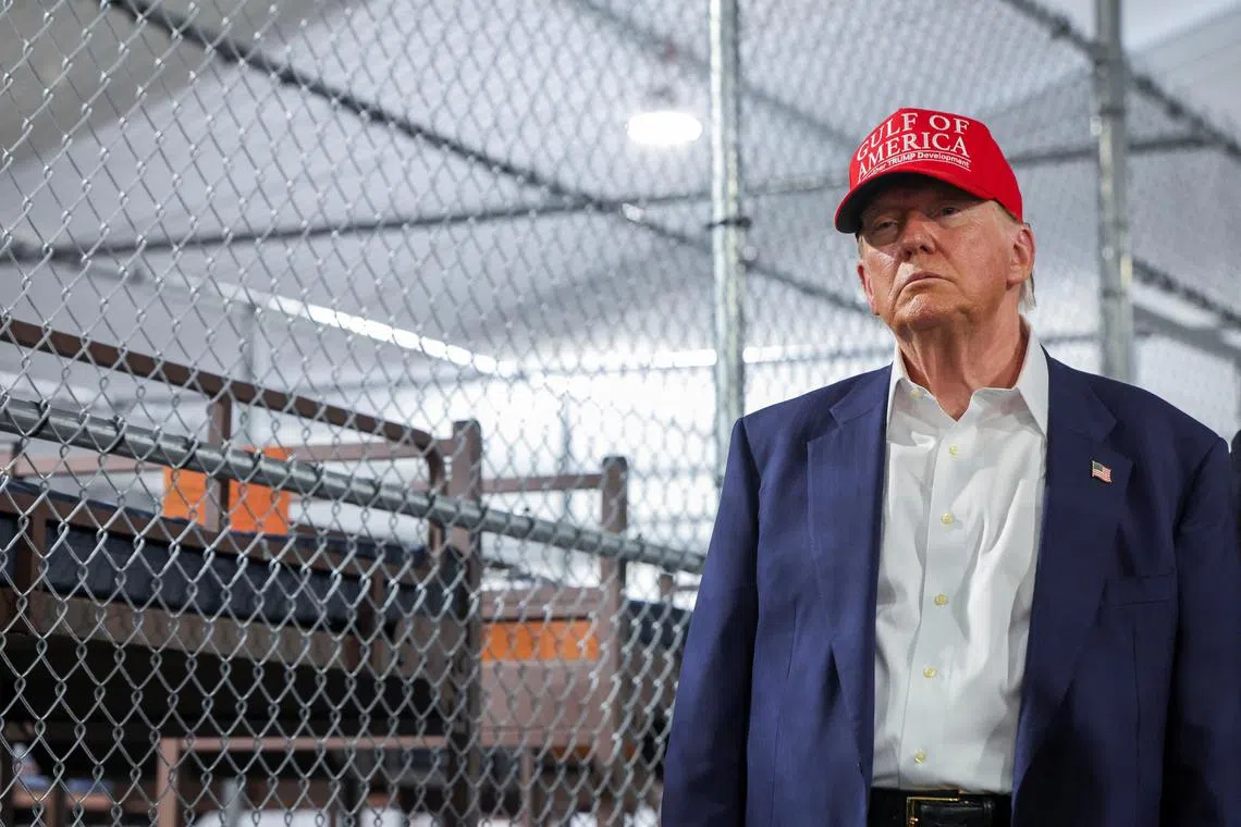 US President Donald Trump visiting a temporary migrant detention centre - informally known as "Alligator Alcatraz" - in Ochopee, Florida, on July 1.