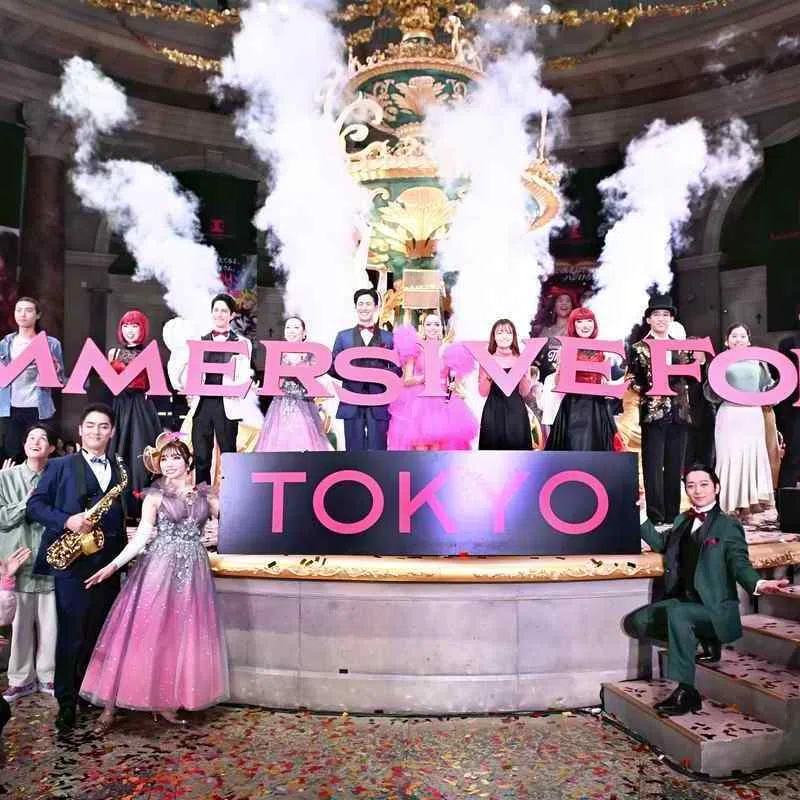 Cast members celebrate the opening of Immersive Fort Tokyo in Tokyo’s Odaiba district in March 2024.