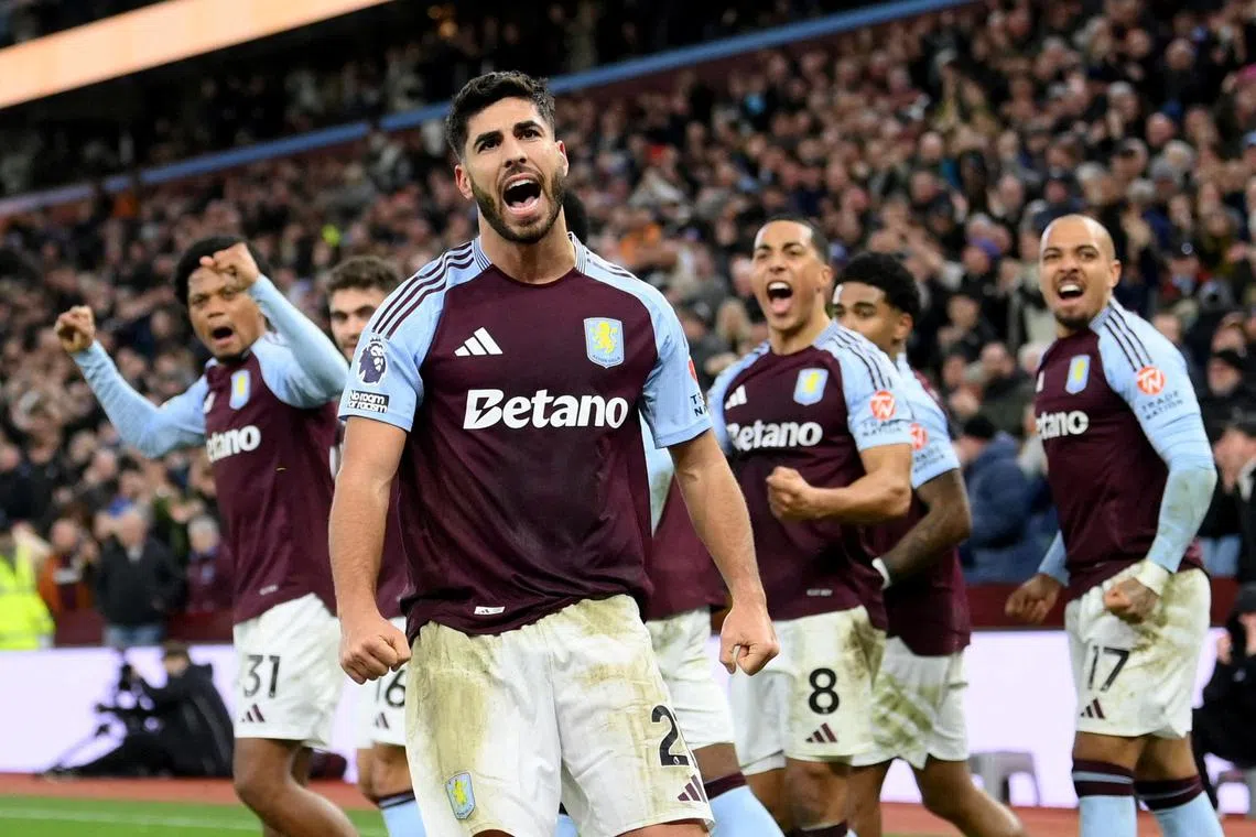 Aston Villa's Marco Asensio celebrates scoring their second goal.