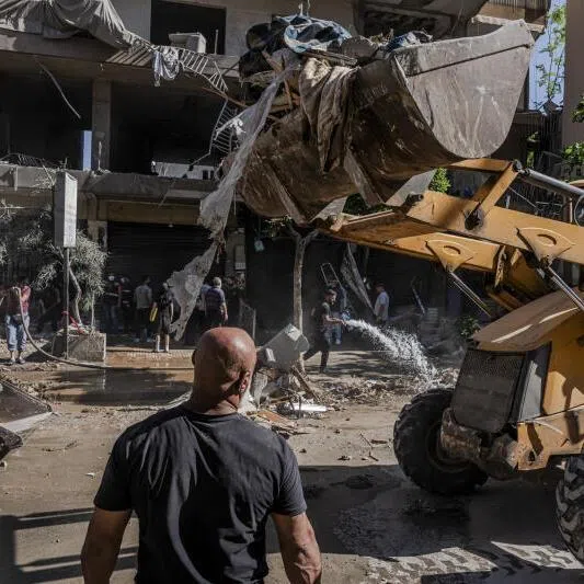 Debris being cleared at the site of an Israeli strike that targeted a residential building in Dahiyeh, in southern Beirut, Lebanon, on June 14.