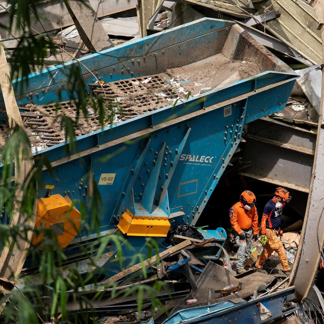 Workers conduct a rescue operation at the collapsed landfill in Binaliw, Cebu, Philippines, on Jan 10.