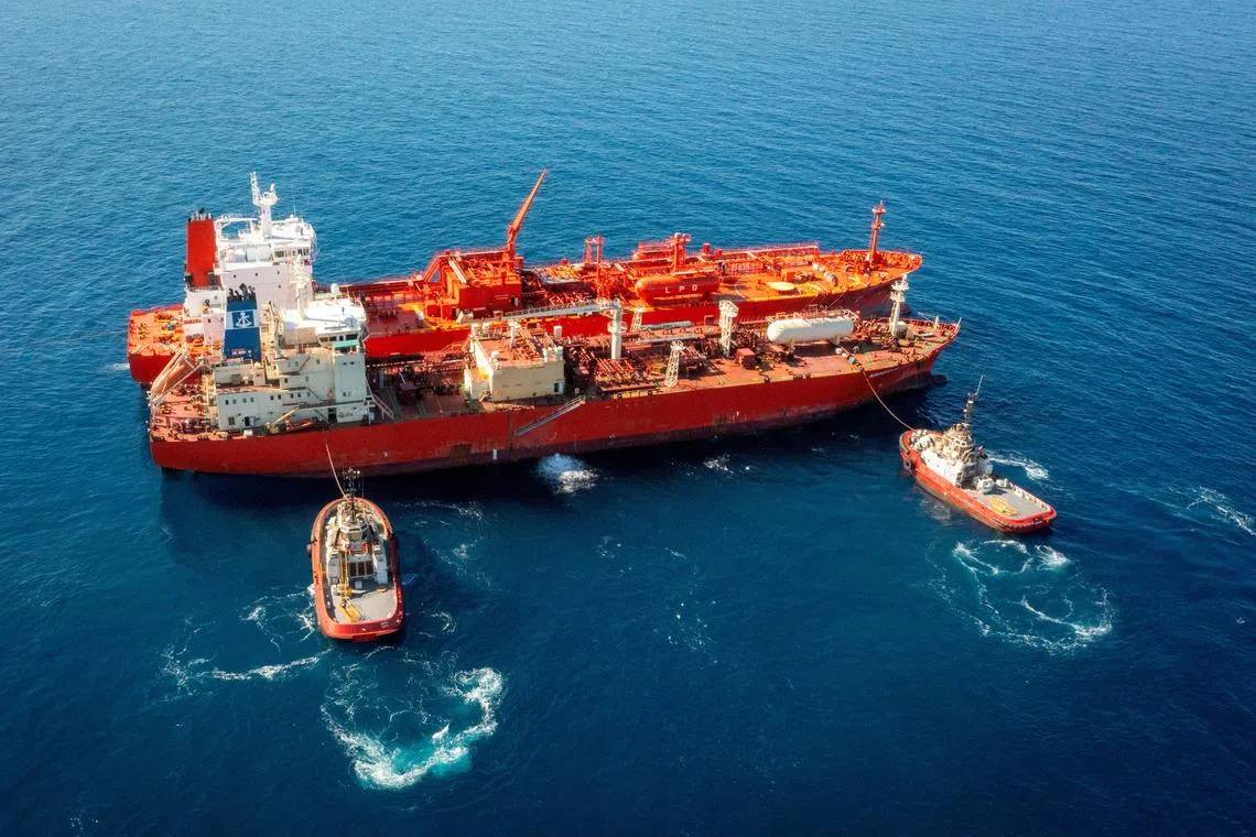 A view of the Green Pioneer and the Navigator Global with Rio Tinto tugboats at the anchorage of Port Dampier, Pilbara, Western Australia, on Sept 15, 2024. 