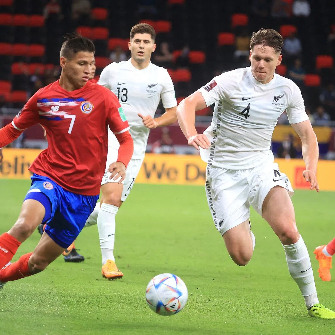 Soccer Football - FIFA World Cup Qualifier - Costa Rica v New Zealand - Al Rayyan Stadium, Al Rayyan, Qatar - June 14, 2022 Costa Rica's Anthony Contreras in action with New Zealand's Nando Pijnaker. REUTERS/Mohammed Dabbous