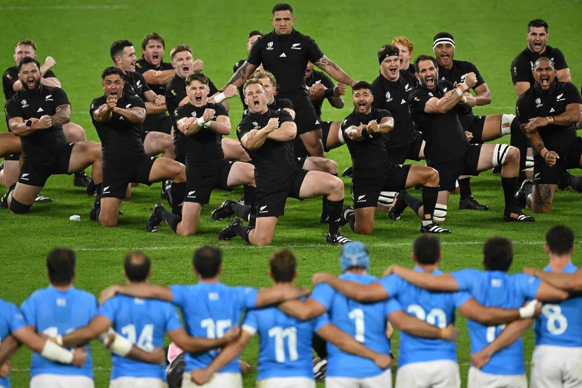 The All Blacks perform the Haka prior to the Rugby World Cup pool match against Uruguay.